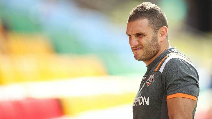 Unhappy: Robbie Farah looks on at Wests Tigers training on Wednesday. Photo: Brendon Thorne