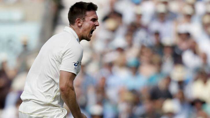 Bell ringer: Australia's Mitchell Marsh celebrates after taking the wicket of England's Ian Bell. Photo: Alastair Grant