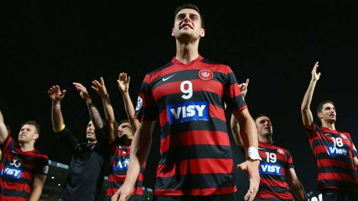 Tomi Juric of the Wanderers celebrates with his team in front of the crowd after victory during the Asian Champions League final match between the Western Sydney Wanderers and Al Hilal at Pirtek Stadium on October 25, 2014. Photo: Mark Kolbe