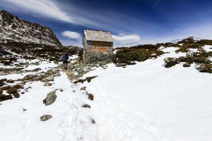 Through the snow to kitchen hut, on the flank of Cradle Mountain. Photo: iStock