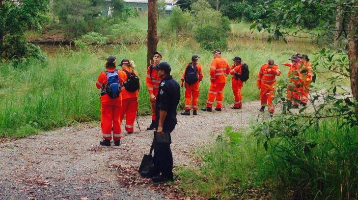 SES volunteers search a Gold Coast Hinterland property for the remains of missing mother Novy Chardon. Photo: Kim Stephens