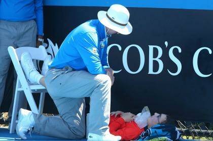 Ballboy faints at last year's Australian Open during a heatwave. Photo: Getty Images.