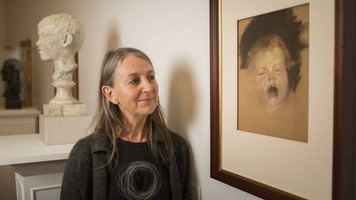 The grandaughter of Australian painter Tom Roberts, Lisa Roberts, with the work she has donated to the National Gallery of Australia.  Photo: Rohan Thomson