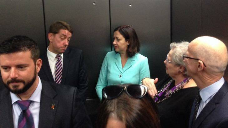Queensland health minister Cameron Dick discussing health funding with premier Annastacia Palaszczuk in the lift at the Princess Alexandra Hospital. Photo: Tony Moore