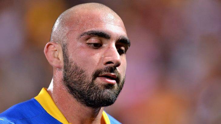 Eels captain Tim Mannah looks dejected – maybe he's worried about the texts Junior Paulo plans to send him this week. Photo: Bradley Kanaris