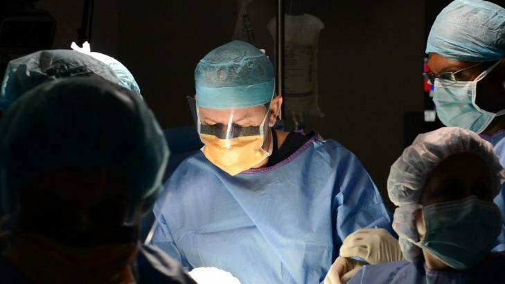 Dr Glenn Gardener performs groundbreaking in-utero surgery on a baby with spina bifida. Photo: Supplied