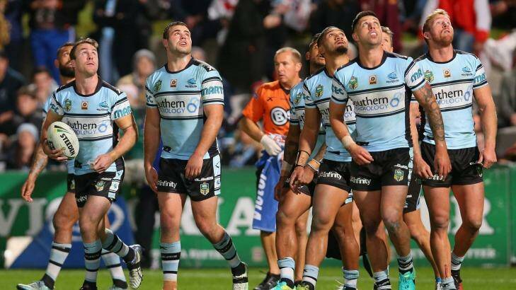 No top-two certainties: Sharks players watch a conversion attempt during the round 23 loss to the St George Illawarra Dragons. Photo: Getty Images 