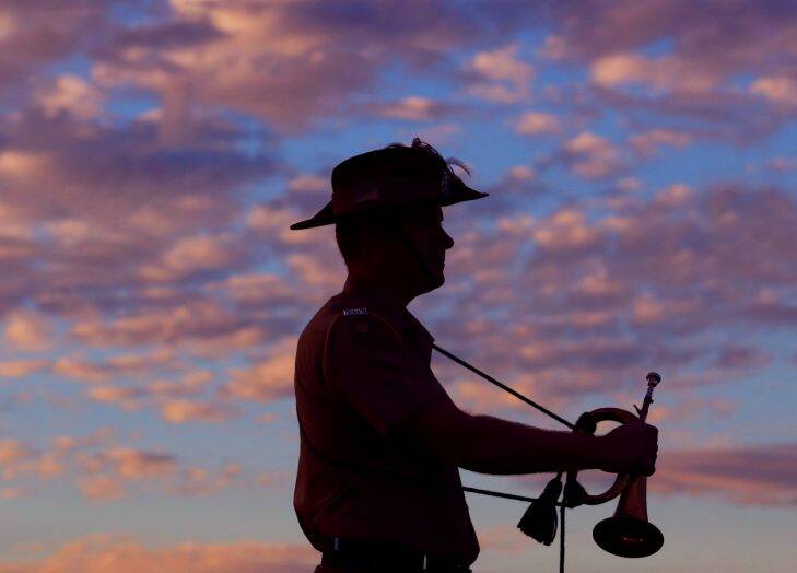 nww294705 - Anzac Day dawn service at Centenary of Anzac Reserve, Kellyville & Castle Hill RSL afterwards. Pictured is the trumpeter who sounded the "Last Post". Picture: Isabella Lettini 25/4/15