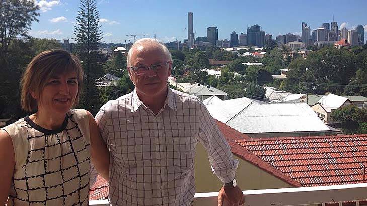 Di Cameron and Jim Reeves on the balcony of their Highgate Hill home. If a development next door is given the go ahead, the couple will be left looking at a wall. Photo: Kim Stephens