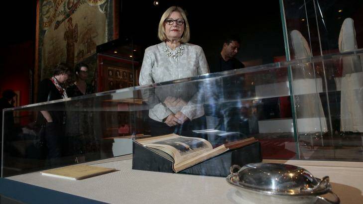 Sir Robert Menzies' grand-niece Annabelle Dennehy, of Brisbane, with the silver serving dish he gave his sister to mark the end of the war. Photo: Jeffrey Chan