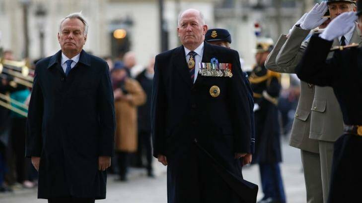Sir Peter Cosgrove attends a ceremony at the Arc de Triomphe on Monday, with Jean-Marc Ayrault. Photo: Australian Embassy Paris