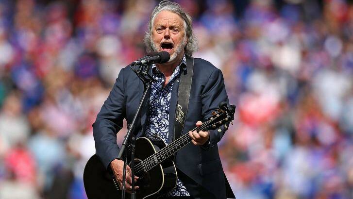Mike Brady performs One Day in October during the 2016 AFL Grand Final. Photo: Scott Barbour