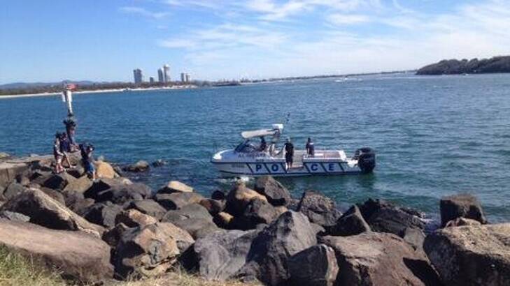 Police divers searching for human remains in the Gold Coast Seaway. Photo: Jarrad Brevi/Ten News, via Twitter.