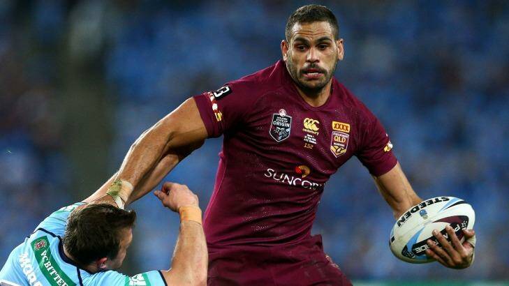 SYDNEY, AUSTRALIA - MAY 27:  Greg Inglis of the Maroons is tackled by Josh Morris of the Blues during game one of the State of Origin series between the New South Wales Blues and the Queensland Maroons at ANZ Stadium on May 27, 2015 in Sydney, Australia.  (Photo by Cameron Spencer/Getty Images) Photo: Cameron Spencer