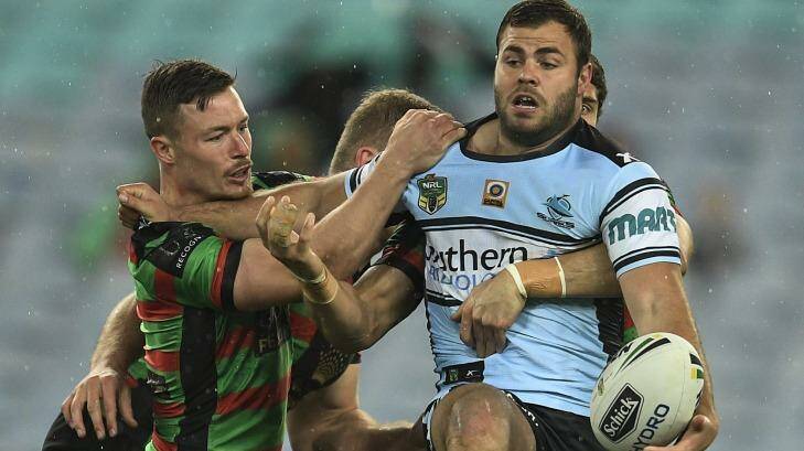 Looking for support: Wade Graham tries to offload during the round 24 NRL match between the South Sydney Rabbitohs and the Cronulla Sharks at ANZ Stadium. Photo: Brett Hemmings