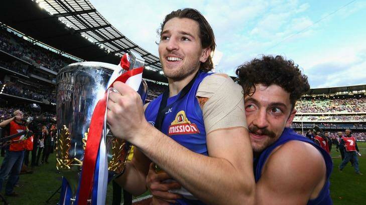 Bontempelli and Tom Liberatore hold tight to that premiership feeling. Photo: Quinn Rooney
