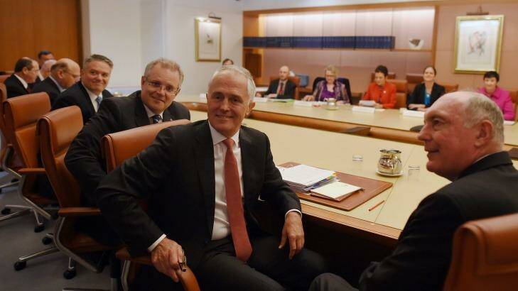 Australian Treasurer Scott Morrison (left), Australian Prime Minister Malcolm Turnbull (centre) and Australian Deputy Prime Minister Warren Truss are seen during a gathering of leaders from business, unions and community during a mini economic summit at Parliament House. Photo: Lukas Coch