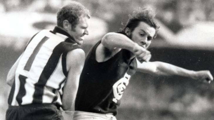 Carlton's Brent Crosswell bumps Collingwood's Terry Waters during the 1970 grand final Photo: Dennis Bull