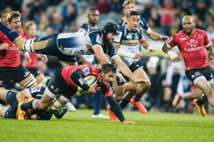 Super Rugby Rd 12. ACT Brumbies v Emirates Lions at GIO Stadium/Canberra Stadium. Brumbies flanker Scott Fardy tries to slow down a Lions opponent.

Photo: Sitthixay Ditthavong Photo: Sitthixay Ditthavong