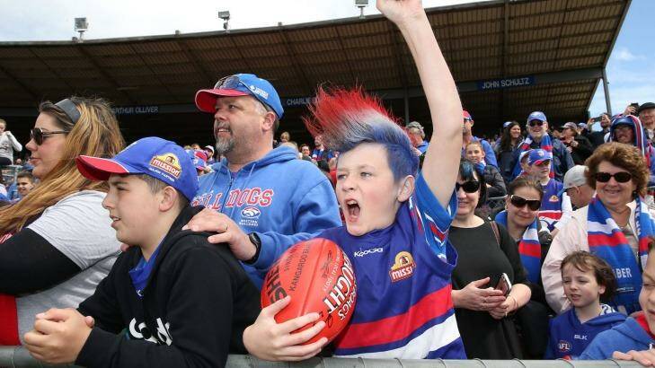 Bulldogs fans show their support during the team's training session at Whitten Oval on Thursday. Photo: AFL Media/Getty Images