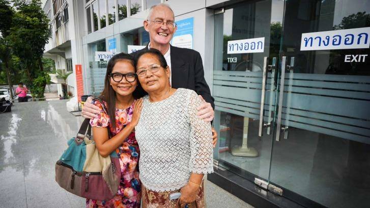 Alan Morison and Chutima Sidasathian with Chutima's mother after their acquittal in Phuket in September. Photo: Dan Miles