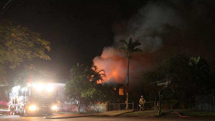 The house in Prospect Street, Wynnum, goes up in flames. Photo: Grant Spicer