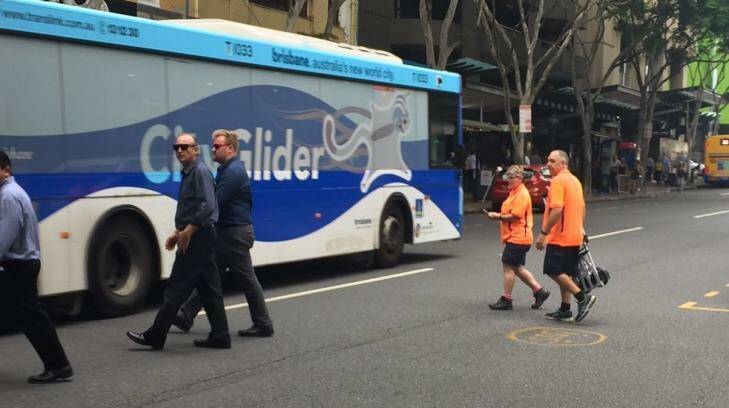 More than 50 people jaywalked across Adelaide Street in 15 minutes on Thursday. Photo: Tony Moore