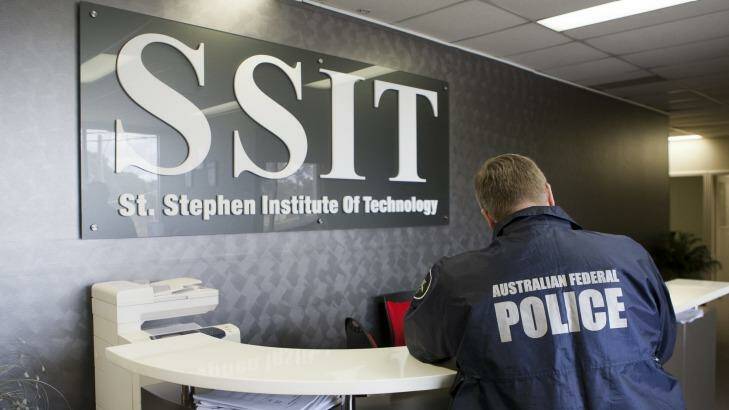 AFP officers at St Stephens Institute of Technology. Its owners were charged with serious fraud offences on Wednesday. Photo: Supplied
