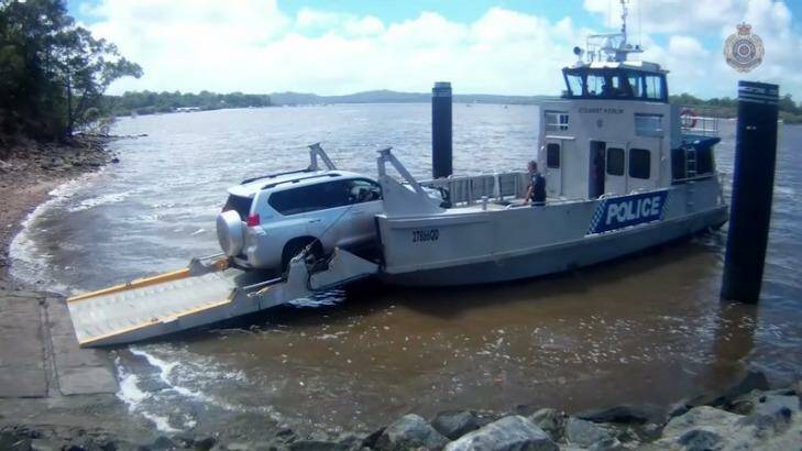Police board a ferry for Macleay Island home. Photo: Supplied