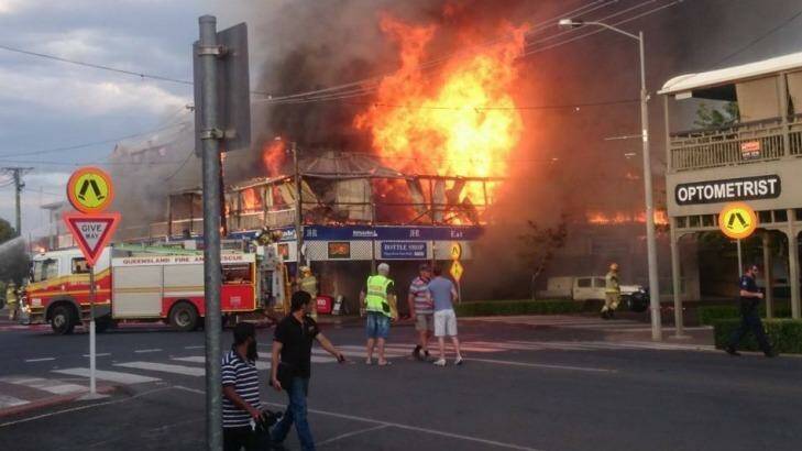 The Royal Hotel, Roma being tended to by fire crews. Photo: Western Star