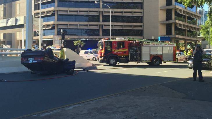 A car has flipped outside Parliament House. Photo: supplied