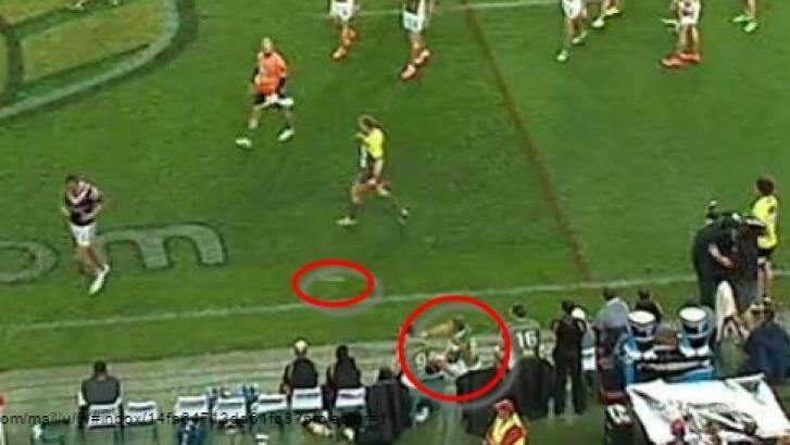 Bottle incident: George Burgess, right, and the bottle circled. 
