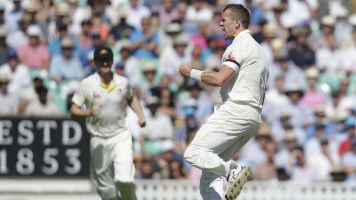 Jubilant: Australia's Peter Siddle celebrates after taking the wicket of England's Adam Lyth. Photo: Alastair Grant
