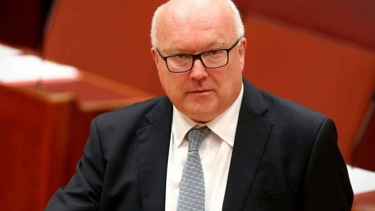 Attorney-General George Brandis is locked in a toxic feud with Solicitor-General Justin Gleeson SC. Photo: Alex Ellinghausen