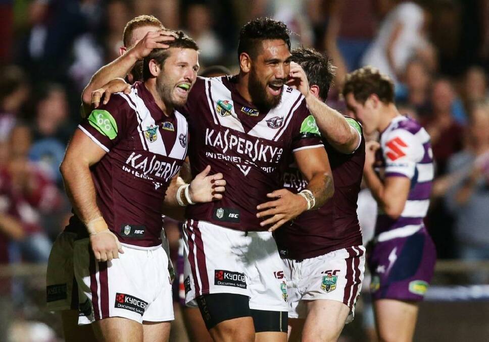 Good buy: Sea Eagles utilty Blake Leary is congratulated after scoring against Melbourne earlier this year. Photo: Matt King