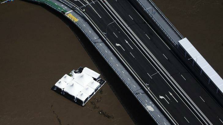 Drift floats down the Brisbane River in January 2011. Photo: Dean Saffron