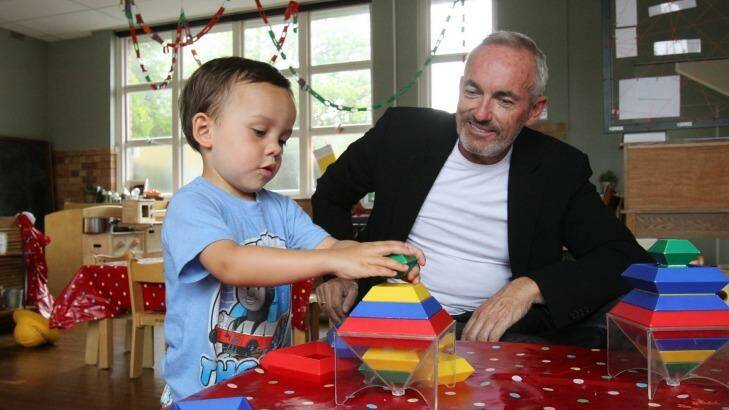 Only About Children founder Brendan McAssey with his son at the Cremorne campus. Photo: Louise Kennerley