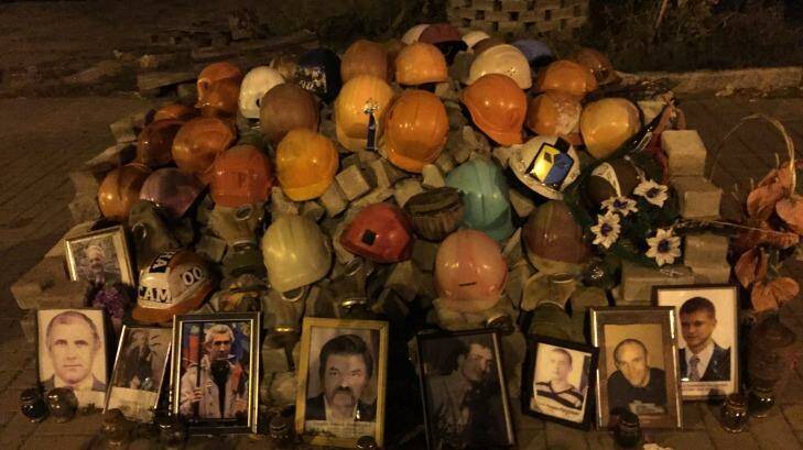 A mound of helmets in Instytutska Street, Kiev, commemorates the dead of 2013. Photo: Goya Dmytryshchak