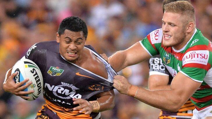 Anthony Milford attempts to break free from the Rabbitohs defense. Photo: Getty Images 