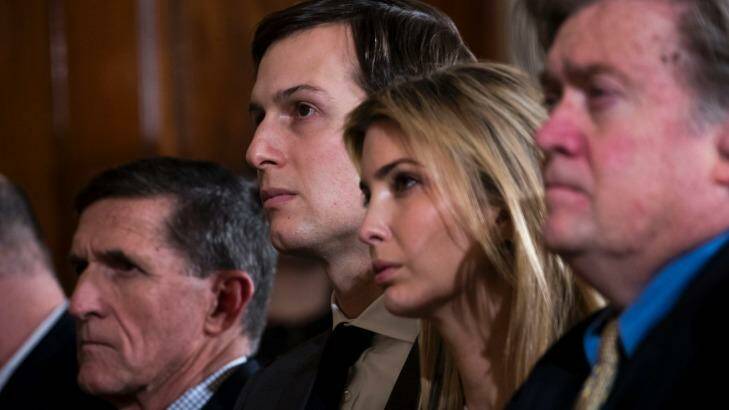 Jared Kushner and his wife, Ivanka Trump, at the White House during the visit of Japanese Prime Minister Shinzo Abe. At left is National Security Adviser Michael Flynn; at right is Steve Bannon.  Photo: New York Times