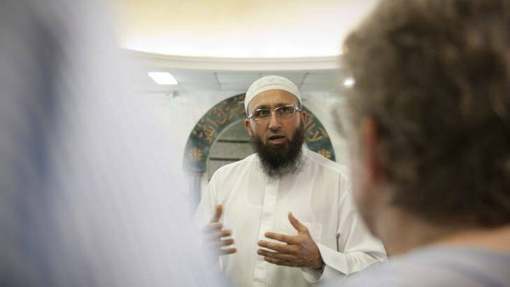Imaan Uzii Akbar speaking to visitors to the Holland Park mosque on September 19. Photo: Robert Shakespeare