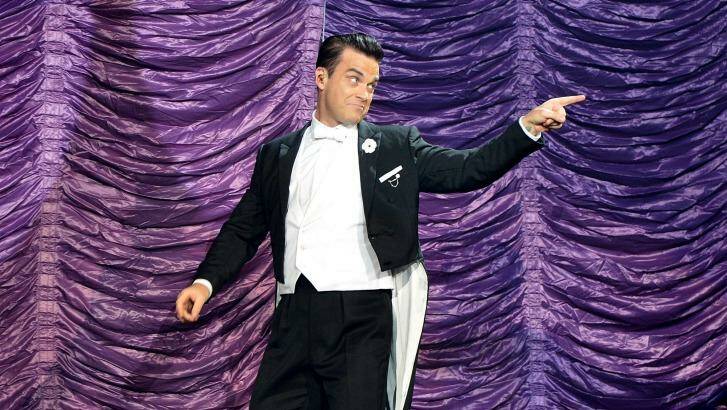 Robbie Williams' charisma makes him a joy to watch.  Photo: Bradley Kanaris
