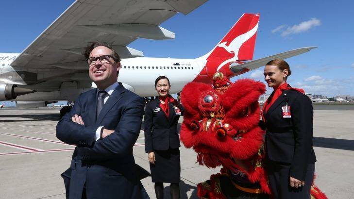 Qantas chief executive Alan Joyce at Sydney Airport on Thursday where he announced the resumption of direct flights to Beijing.  Photo: Louise Kennerley
