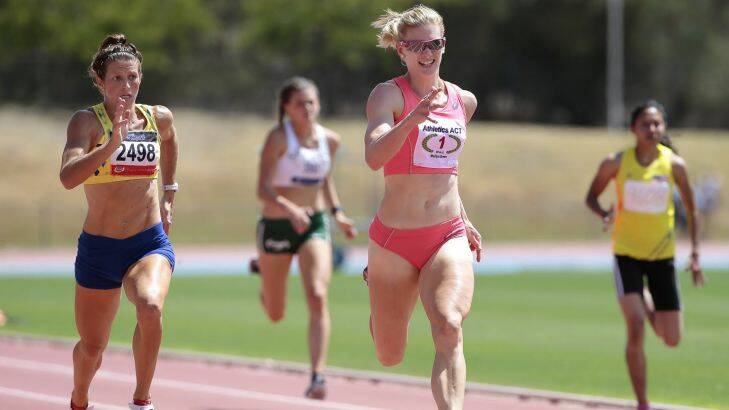 Sport.  2014-15 AACT T & F Championships at the AIS Athletics Track.  Melissa Breen, centre, wins the open womens final of the 200m with a time of 23.70.  22 February 2015.  Canberra Times photo by Jeffrey Chan.