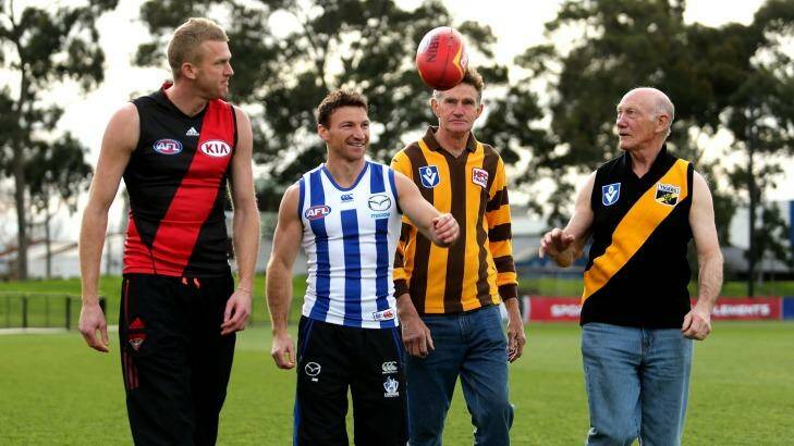 Dustin Fletcher with the other members of the "400 club": Brent Harvey, Michael Tuck and Kevin Bartlett. Photo: Pat Scala