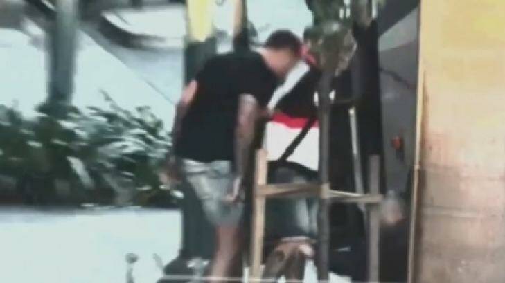 The two men are alleged to have attacked the driver at Surfers Paradise. Photo: Nine News/Courtesy of Gold Coast