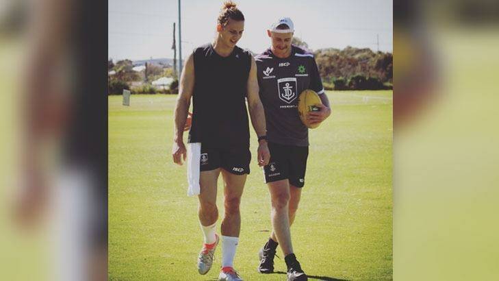 A photo tweeted by the Dockers last week seems to show him with a height advantage over Cam McCarthy. Photo: Twitter: @fredockers