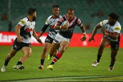 Making a break: Blake Ferguson makes a break for the Roosters during the round three NRL match against the Penrith Panthers at Allianz Stadium. Photo: Mark Kolbe