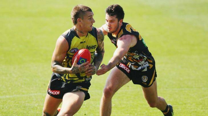 Dustin Martin tries to evade Corey Ellis during Richmond's intraclub match on Friday. Photo: Michael Dodge