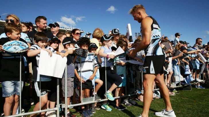 Sign of the times: Matt Prior signs autographs for fans at Southern Cross Group Stadium. Photo: Matt King